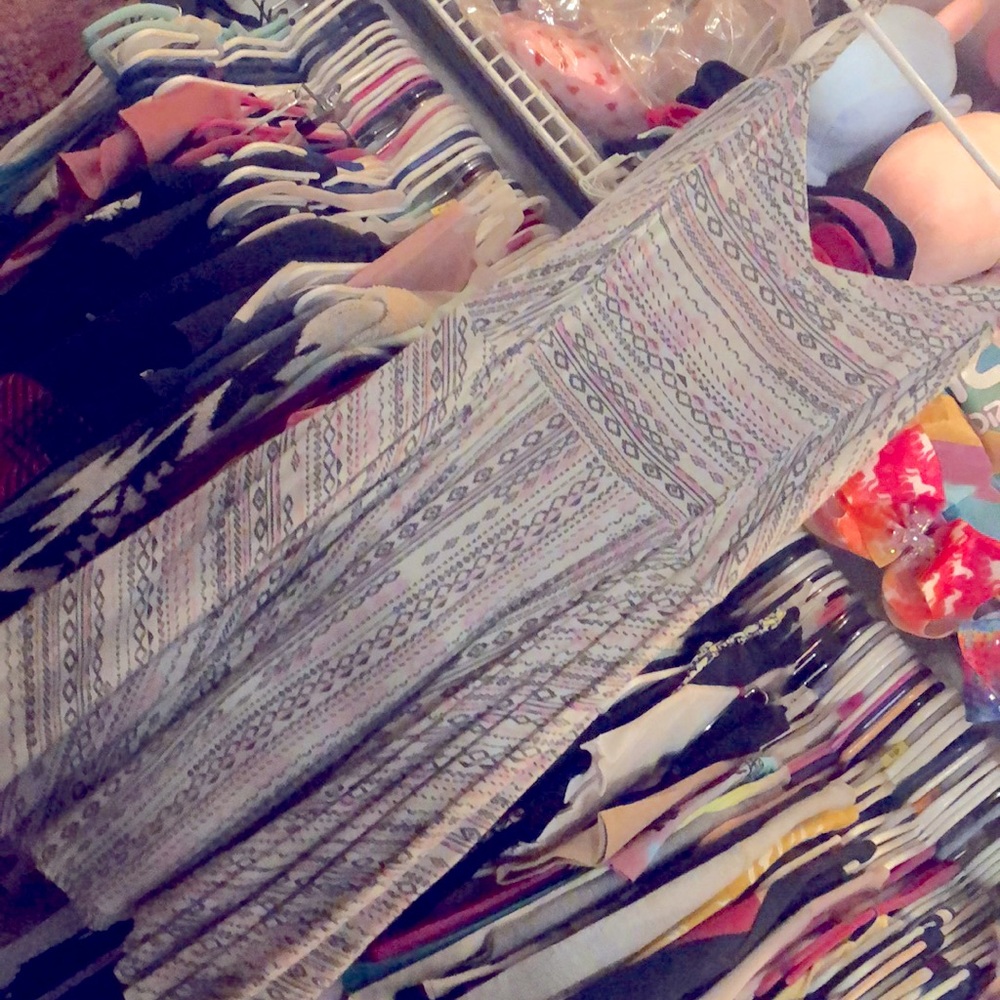 Very cute flowy lightweight dress.